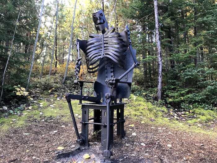 Iron Man in Chair sculpture